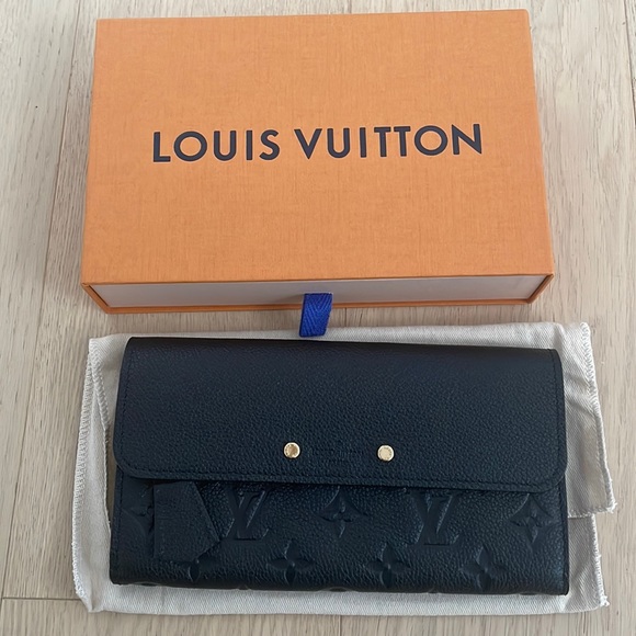 Louis Vuitton leather wallet - Picture 1 of 7